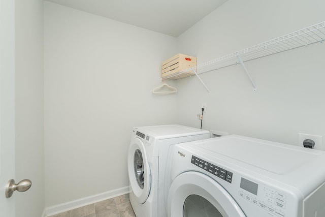 6058 Whitewater Dr, North Augusta, SC 29841 - laundry area featuring washing machine and clothes dryer and baseboards