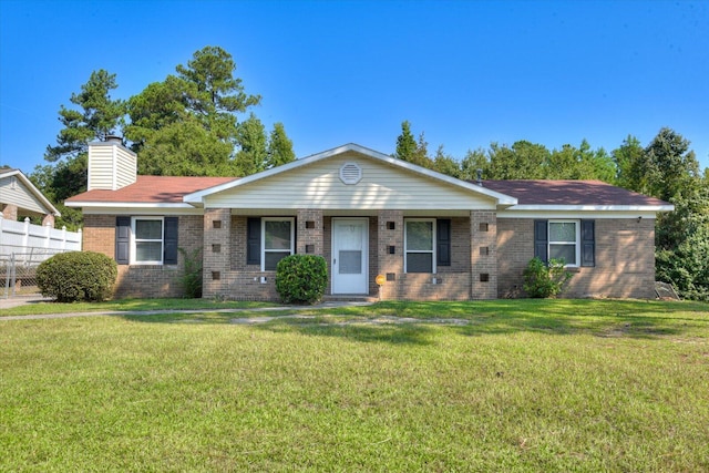 single story home with a front lawn