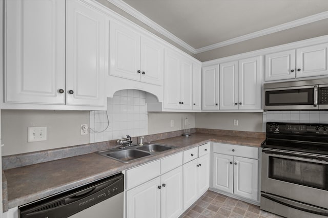 2807 Brickrun Way, Augusta, GA 30909 - kitchen featuring stainless steel appliances, white cabinets, ornamental molding, and tasteful backsplash