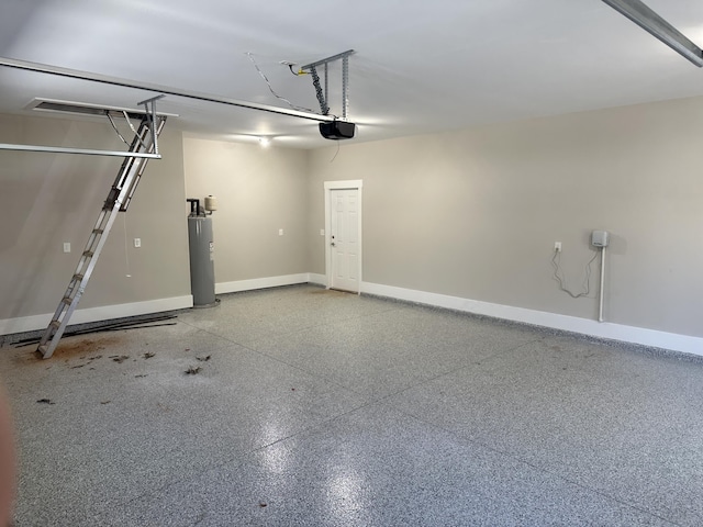 garage with electric water heater, a garage door opener, and baseboards