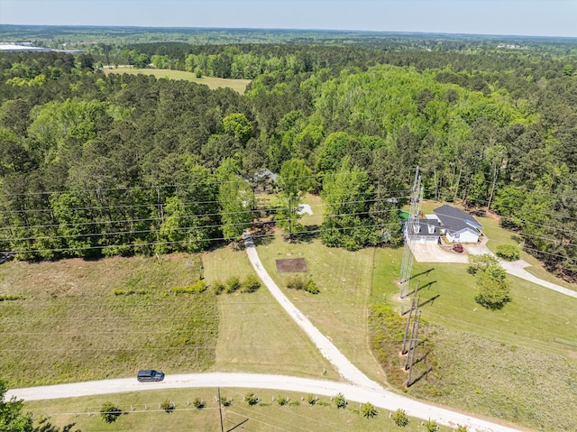 aerial view featuring a forest view