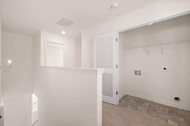 clothes washing area featuring visible vents, light colored carpet, washer hookup, laundry area, and electric dryer hookup