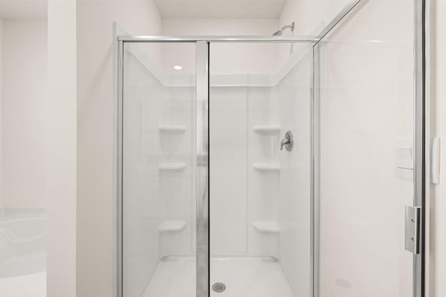 full bath featuring a stall shower