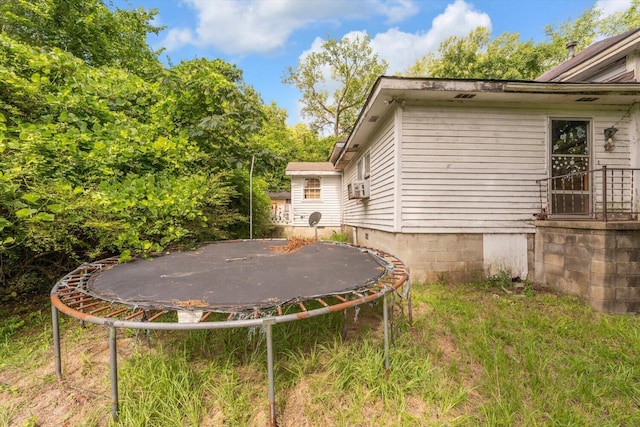 485 Adams St, Sparta, GA 31087 - view of yard with a trampoline and cooling unit