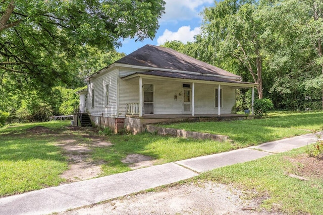 485 Adams St, Sparta, GA 31087 - view of front of property with a porch and a front yard