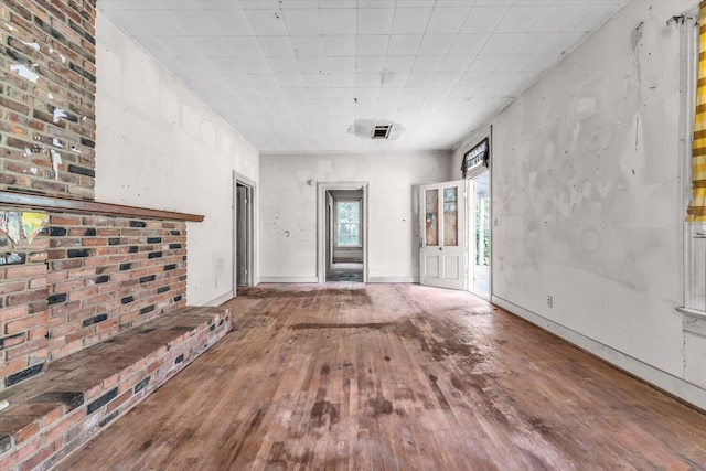 485 Adams St, Sparta, GA 31087 - unfurnished living room with wood-type flooring