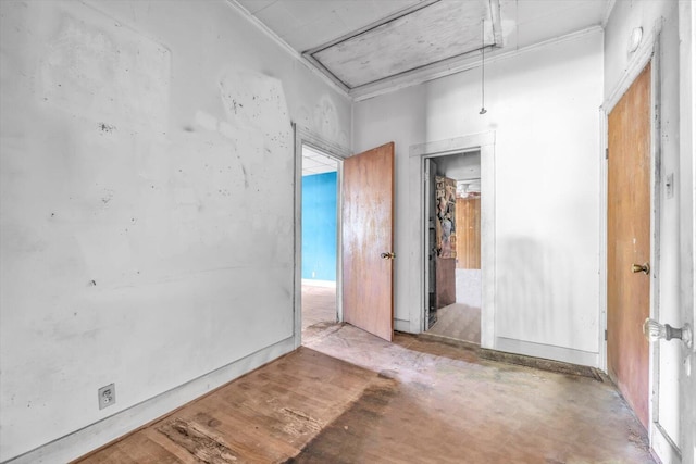485 Adams St, Sparta, GA 31087 - unfurnished bedroom with attic access and ornamental molding