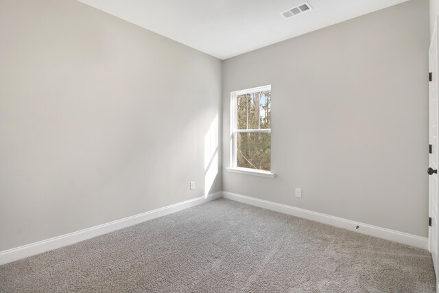 1675 Pine Ridge Dr N, Hephzibah, GA 30815 - empty room featuring light carpet and baseboards