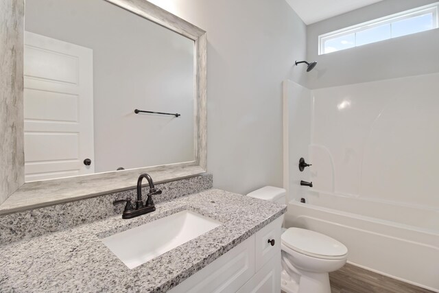 1675 Pine Ridge Dr N, Hephzibah, GA 30815 - full bath featuring toilet, vanity, shower / bath combination, and wood finished floors
