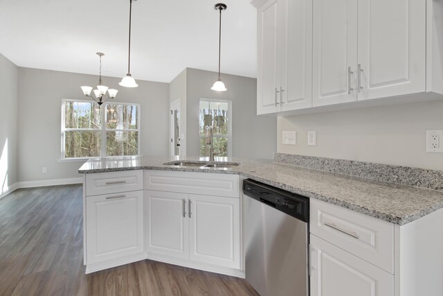 1675 Pine Ridge Dr N, Hephzibah, GA 30815 - kitchen featuring stainless steel dishwasher, a sink, a peninsula, and dark wood-style flooring