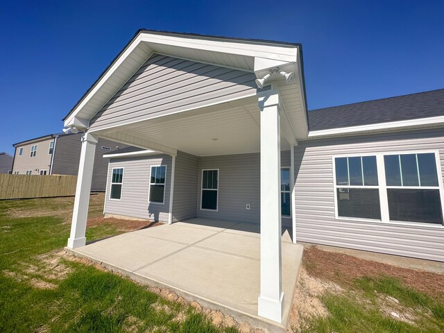 1675 Pine Ridge Dr N, Hephzibah, GA 30815 - rear view of house featuring a patio area and an attached carport