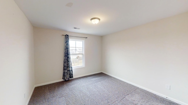 view of carpeted spare room