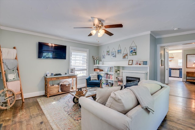 1703 Marion Ave, North Augusta, SC 29841 - living room with a ceiling fan, wood-type flooring, ornamental molding, and a fireplace