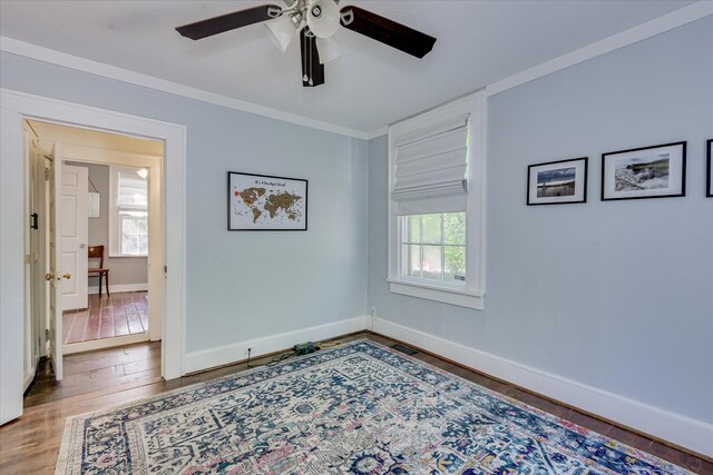 1703 Marion Ave, North Augusta, SC 29841 - spare room with ceiling fan, hardwood / wood-style floors, plenty of natural light, and ornamental molding