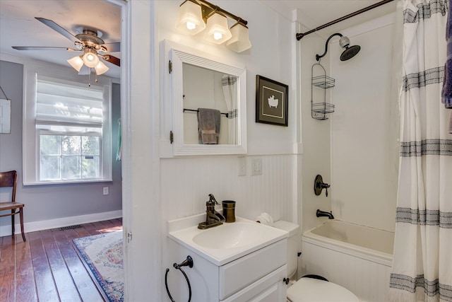 1703 Marion Ave, North Augusta, SC 29841 - bathroom featuring vanity, shower / tub combo, wood-type flooring, ceiling fan, and wainscoting