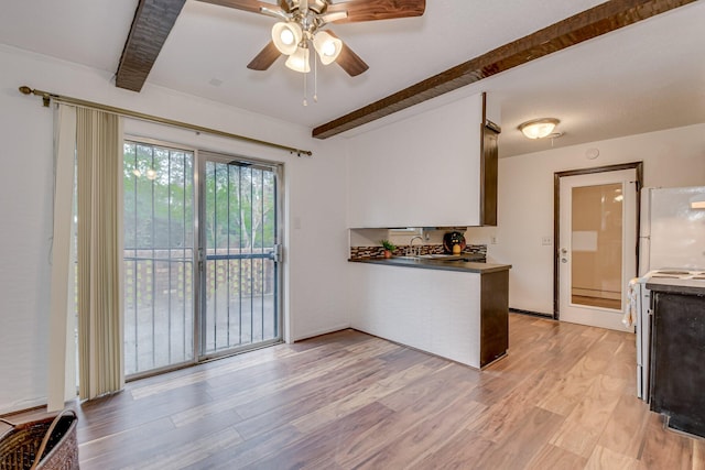 3554 Gardenbrook Dr, Augusta, GA 30906 - kitchen featuring beamed ceiling, freestanding refrigerator, a ceiling fan, light wood finished floors, and a peninsula