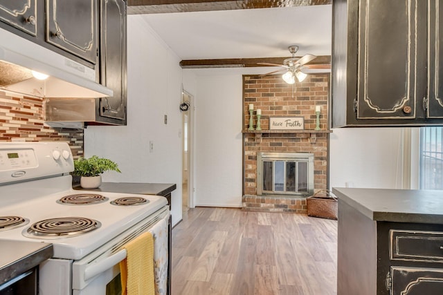 3554 Gardenbrook Dr, Augusta, GA 30906 - kitchen featuring white electric range, a ceiling fan, a fireplace, light wood finished floors, and ornamental molding