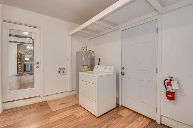 3554 Gardenbrook Dr, Augusta, GA 30906 - clothes washing area featuring washer / clothes dryer, water heater, and light wood finished floors