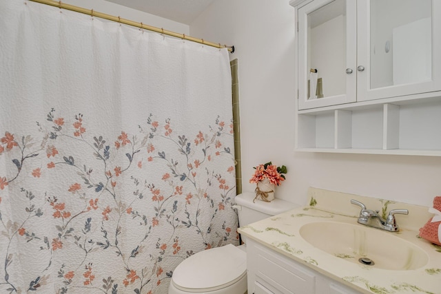 3554 Gardenbrook Dr, Augusta, GA 30906 - bathroom with toilet, vanity, and curtained shower