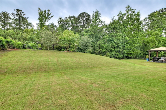 1548 Driftwood Ln, Grovetown, GA 30813 - view of grassy yard with a gazebo and view of scattered trees