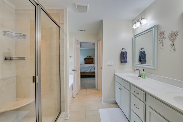 1548 Driftwood Ln, Grovetown, GA 30813 - ensuite bathroom with double vanity, a stall shower, and tile patterned floors