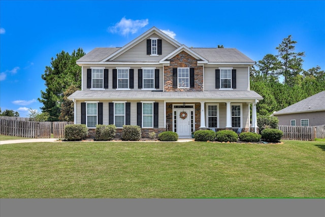 view of front of home featuring a front lawn