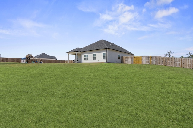 view of yard with a fenced backyard