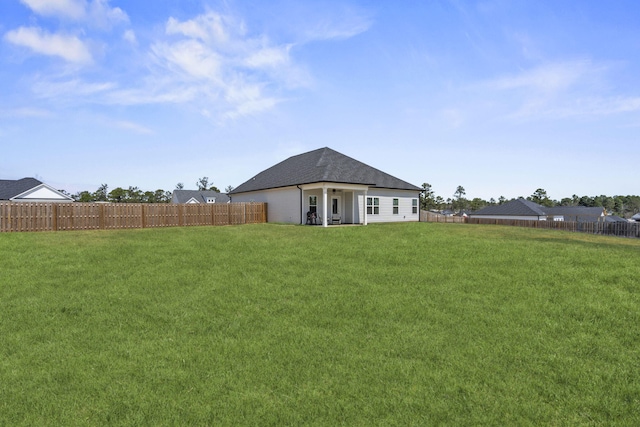 view of yard featuring a fenced backyard