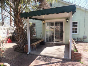 back of house with a patio area