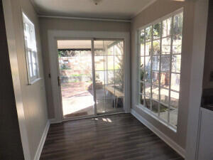 interior space with dark hardwood / wood-style flooring