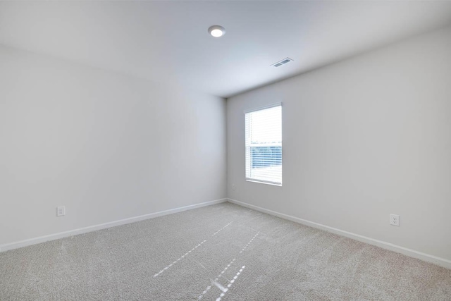 empty room with light carpet