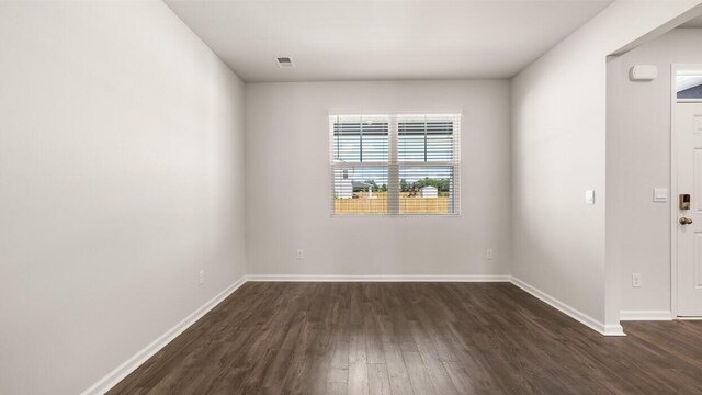 unfurnished bedroom with light colored carpet and a closet