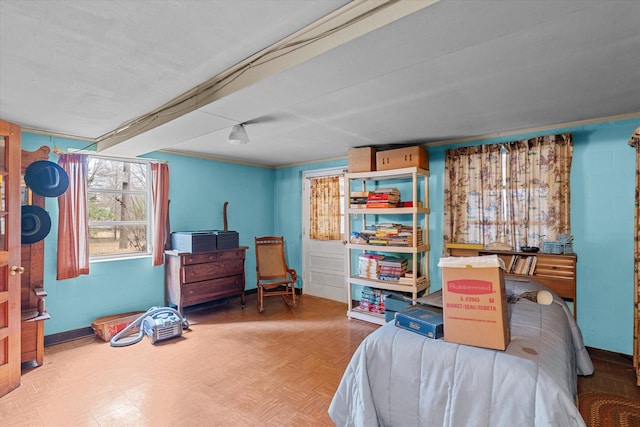 bedroom featuring parquet flooring