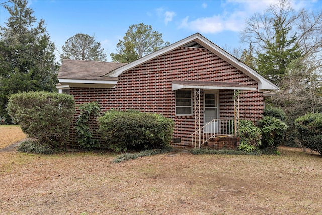 bungalow with a front lawn