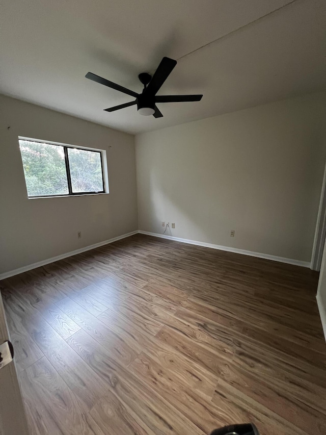 1404 Windsong Cir, Augusta, GA 30907 - unfurnished room with wood finished floors, a ceiling fan, and baseboards