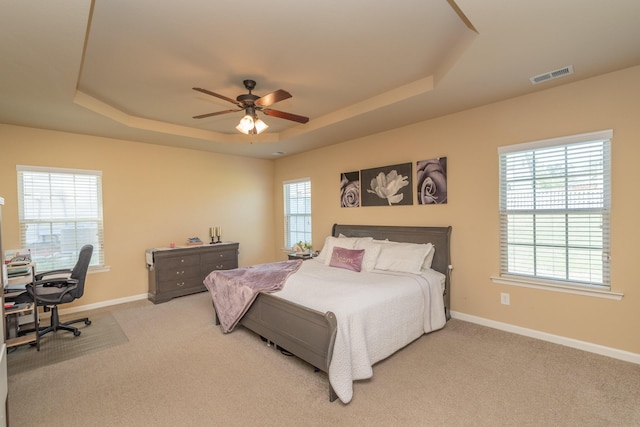 6003 Reynolds Cir, Grovetown, GA 30813 - bedroom with ceiling fan, carpet, visible vents, a raised ceiling, and baseboards