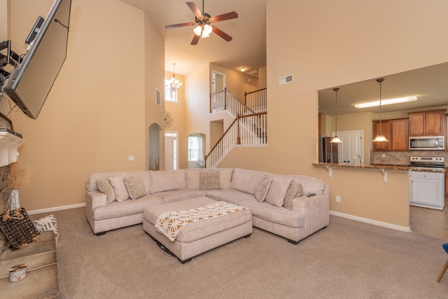 6003 Reynolds Cir, Grovetown, GA 30813 - living area featuring visible vents, baseboards, a ceiling fan, carpet floors, and stairway