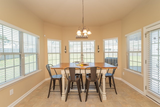 6003 Reynolds Cir, Grovetown, GA 30813 - dining room with a notable chandelier, baseboards, and plenty of natural light