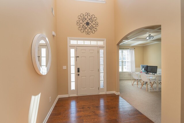 6003 Reynolds Cir, Grovetown, GA 30813 - entryway featuring baseboards, arched walkways, dark wood-style floors, beamed ceiling, and coffered ceiling