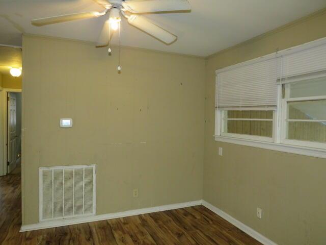2202 Vireo Dr, North Augusta, SC 29841 - unfurnished room featuring wood finished floors, a ceiling fan, and crown molding