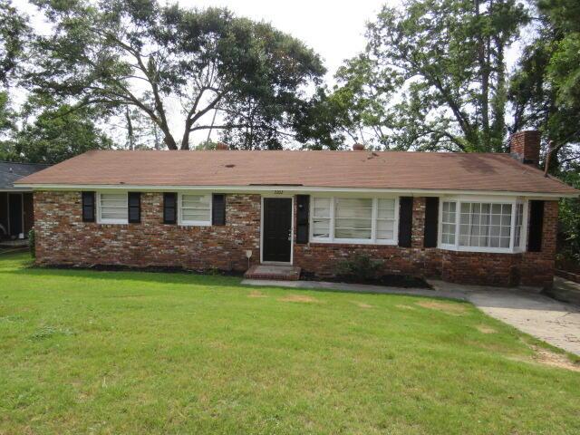 2202 Vireo Dr, North Augusta, SC 29841 - ranch-style home featuring a chimney, brick siding, and a front yard