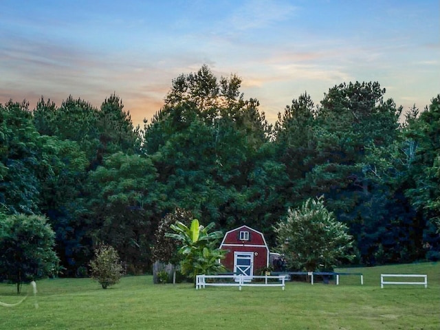 exterior space featuring an outbuilding