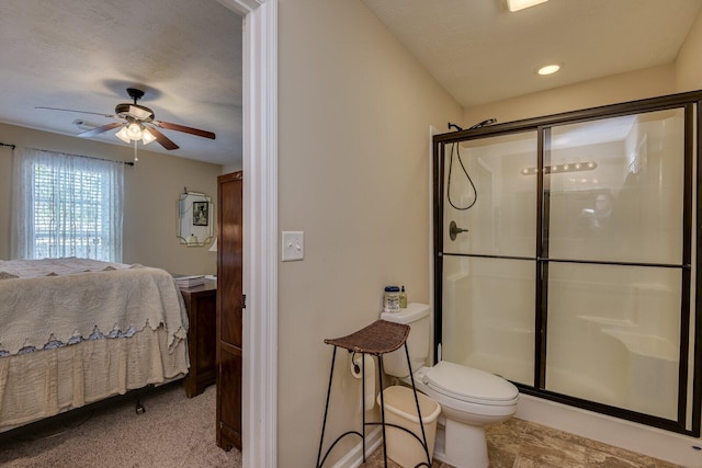 full bath with a textured ceiling, a stall shower, ensuite bath, and a ceiling fan