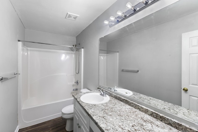 26 Charlestowne Dr, Augusta, GA 30907 - bathroom featuring toilet, vanity, wood finished floors, and shower / bathtub combination