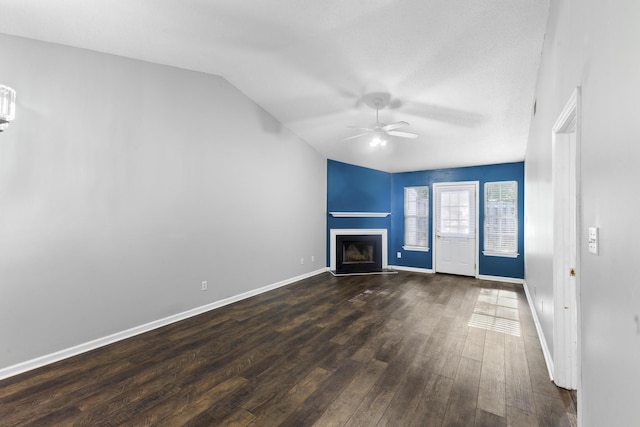 26 Charlestowne Dr, Augusta, GA 30907 - unfurnished living room featuring a ceiling fan, a fireplace, dark wood-type flooring, vaulted ceiling, and baseboards