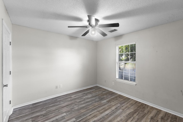 26 Charlestowne Dr, Augusta, GA 30907 - spare room featuring wood finished floors, ceiling fan, a textured ceiling, and baseboards
