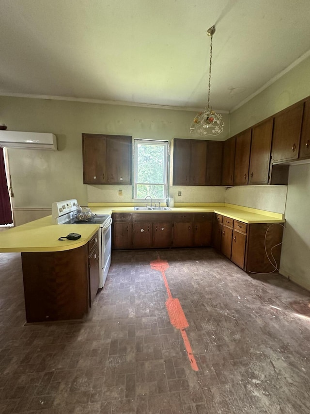 kitchen with pendant lighting, crown molding, sink, a wall mounted AC, and white electric range oven