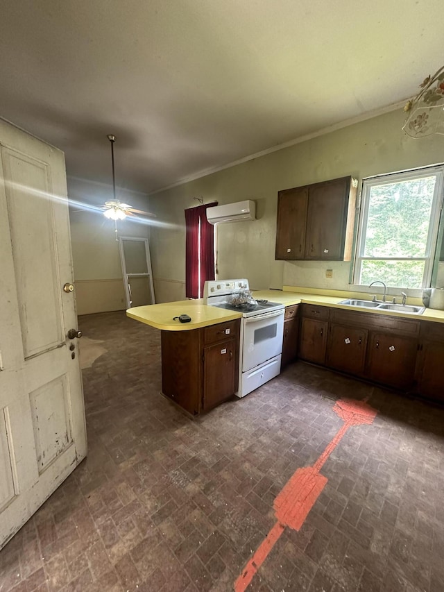 kitchen with white range with electric cooktop, sink, ceiling fan, range hood, and kitchen peninsula