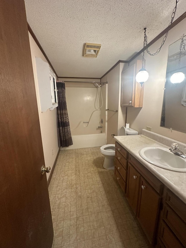 full bathroom with vanity, toilet, ornamental molding, a textured ceiling, and shower / tub combo