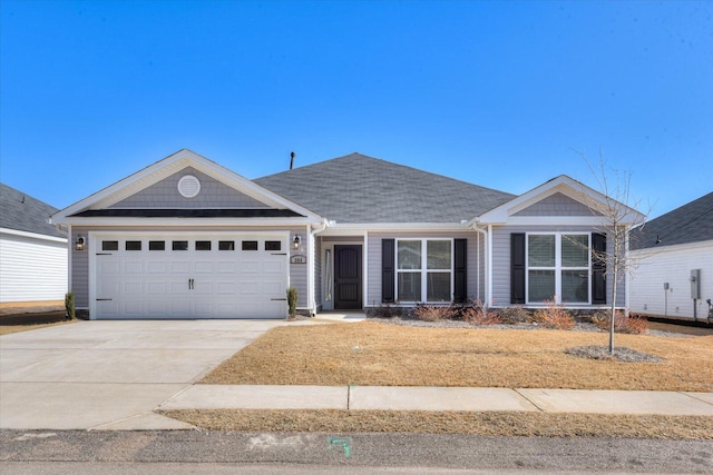 ranch-style home featuring a garage